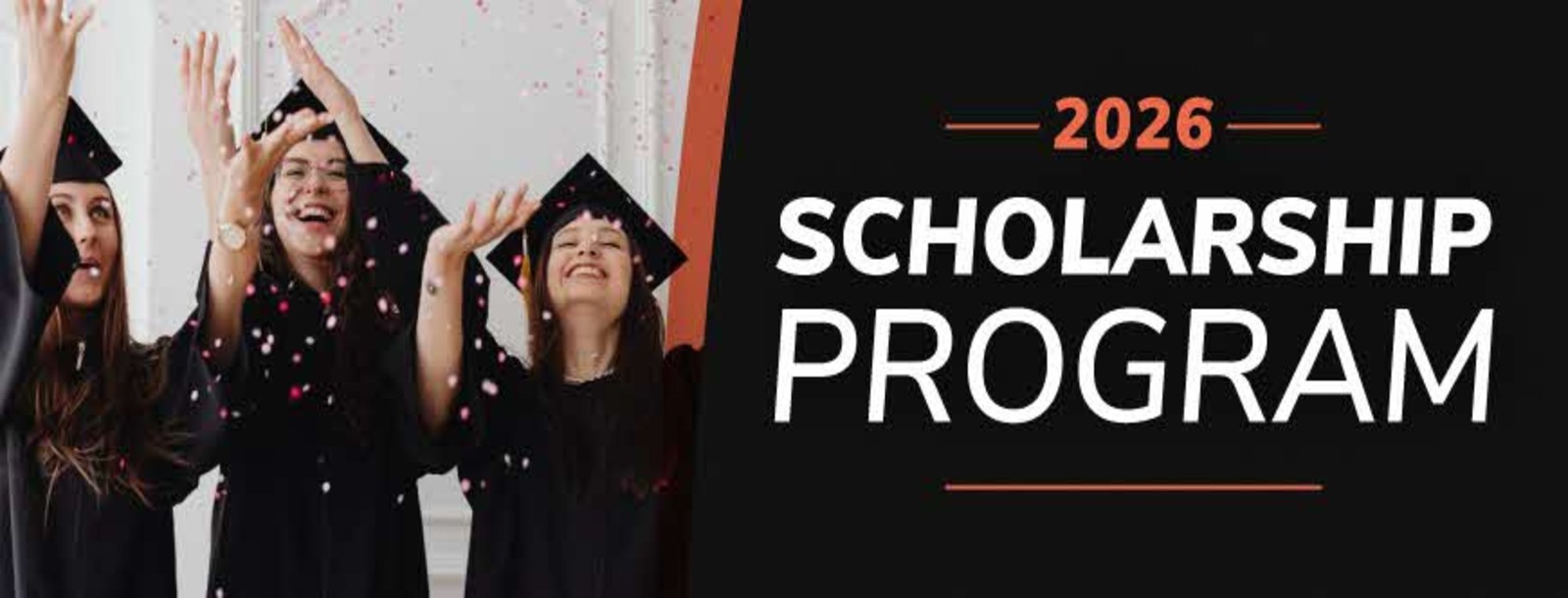 graduates smiling and raising their hands up